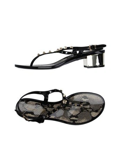 Shop Roberto Cavalli Flip Flops In Black