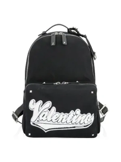 Shop Valentino Patched Logo Canvas Backpack In Black White