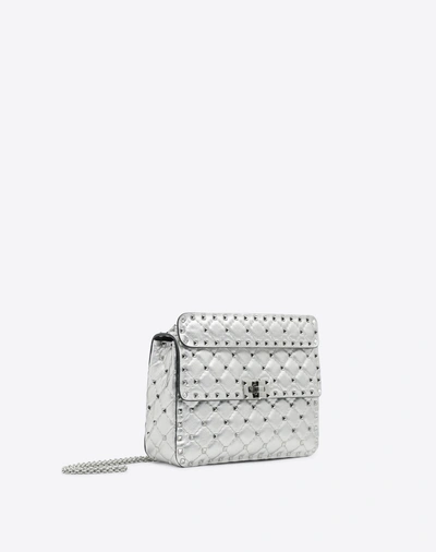 Shop Valentino Garavani Medium Metallic Rockstud Spike Bag In Silver