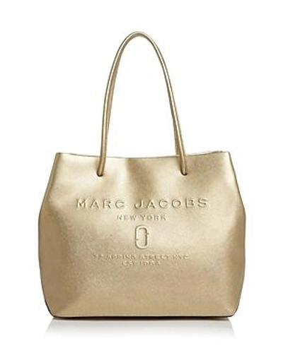 Shop Marc Jacobs Logo East/west Leather Tote In Gold/gold