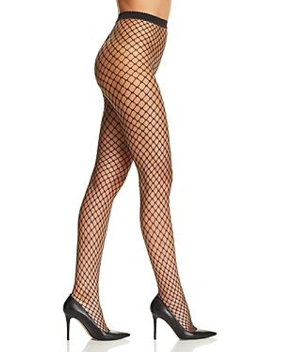 Shop Wolford Tina Summer Fishnet Tights In Black