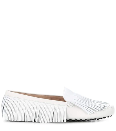 Shop Tod's Gommino Fringe Leather Loafers In White