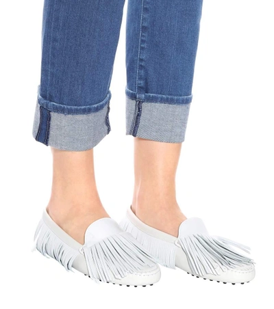 Shop Tod's Gommino Fringe Leather Loafers In White