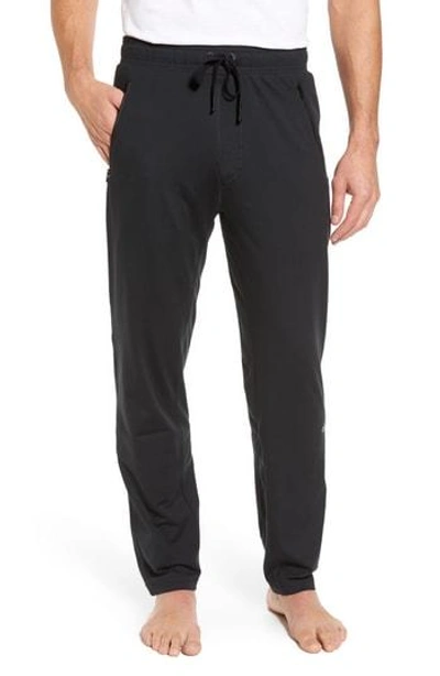 Shop Alo Yoga Renew Relaxed Lounge Pants In Black