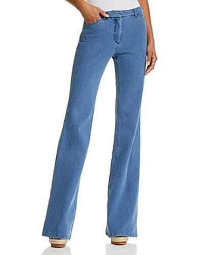Shop Theory Demitria Flare Jeans In Movement Denim Light