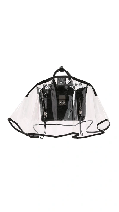Shop The Handbag Raincoat Mini City Slicker Handbag Raincoat In Clear/black