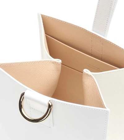Shop Jil Sander Bell Leather Clutch In White