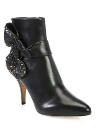 Shop Valentino Studded Side Bow Ankle Boots In Black