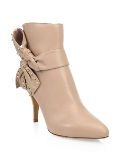 Shop Valentino Studded Side Bow Ankle Boots In Poudre