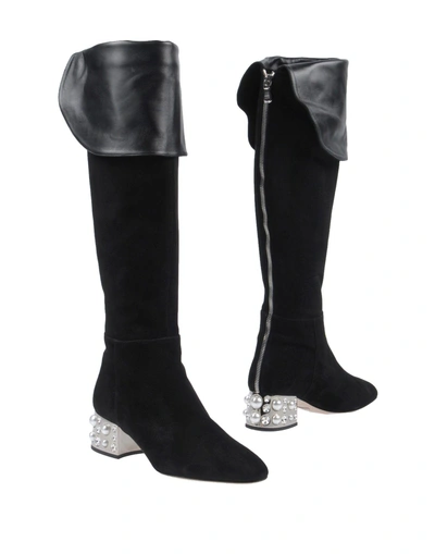 Shop Sebastian Boots In Black