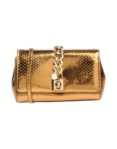 Shop Dolce & Gabbana Handbags In Gold