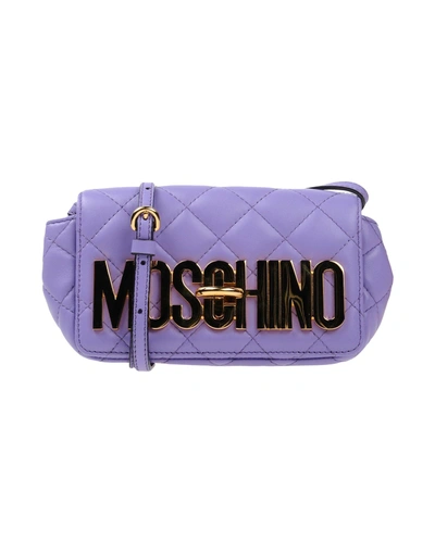 Shop Moschino Handbags In Purple