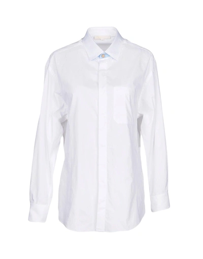 Shop Maje Solid Color Shirts & Blouses In White