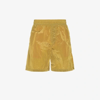 Shop Stone Island Metal Garment Dyed Swim Shorts In Yellow&orange