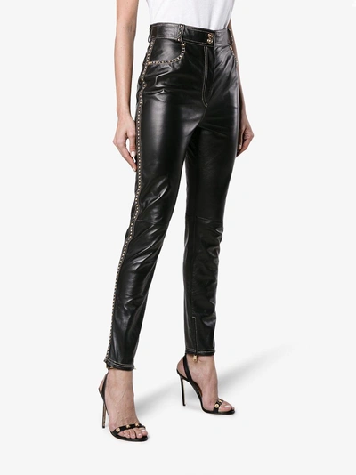 Shop Versace Slim-fit Leather Trousers In Black