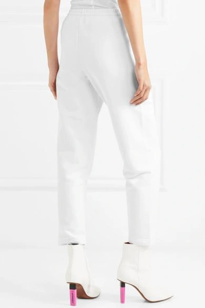 Shop Vetements Embroidered Stretch-cotton Track Pants In White