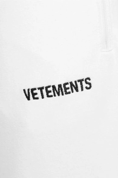 Shop Vetements Embroidered Stretch-cotton Track Pants In White