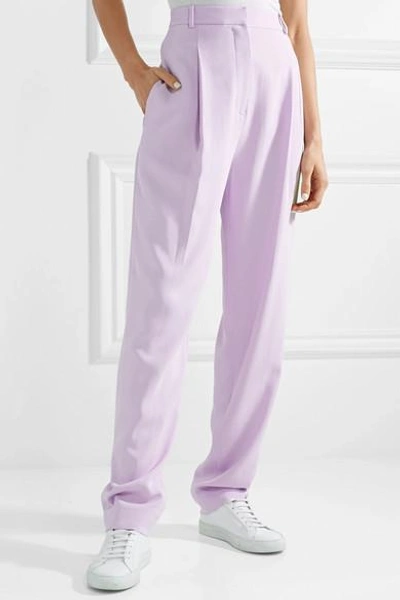Shop Tibi Pleated Crepe Tapered Pants In Lavender