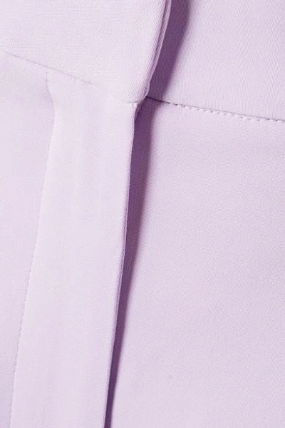Shop Tibi Pleated Crepe Tapered Pants In Lavender