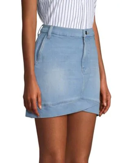 Shop Frame Denim Mini Skirt In Ocean