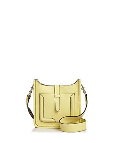 Shop Rebecca Minkoff Mini Unlined Feed Leather Crossbody - 100% Exclusive In Soft Yellow/silver