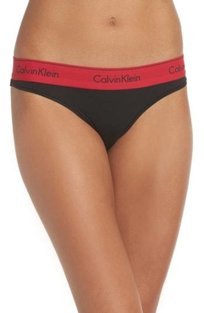 Shop Calvin Klein Logo Thong In Black Empower