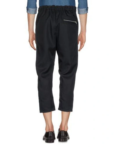 Shop Oamc 3/4-length Shorts In Black