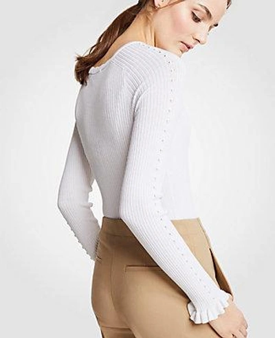 Shop Ann Taylor Ribbed Ruffle Cuff Sweater In White