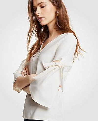 Shop Ann Taylor Petite Bow Sleeve Top In Winter White