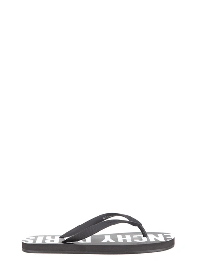 Shop Givenchy Logo Sole Flip Flops In Black