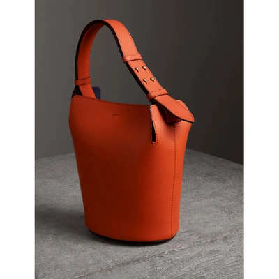 Shop Burberry The Small Leather Bucket Bag In Clementine