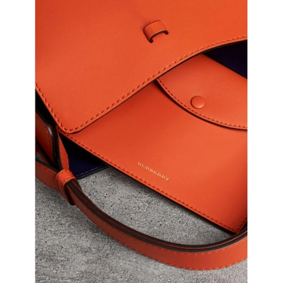 Shop Burberry The Small Leather Bucket Bag In Clementine