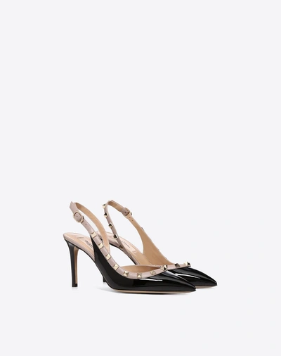 Shop Valentino Garavani Rockstud Patent-leather Slingback Pump 85 Mm In Black/poudre