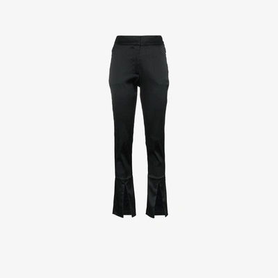 Shop Beaufille Lenea Satin Slim Leg Trousers In Black
