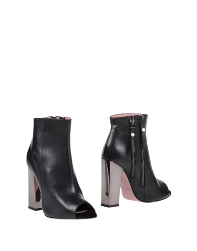 Shop Tipe E Tacchi Ankle Boot In Black