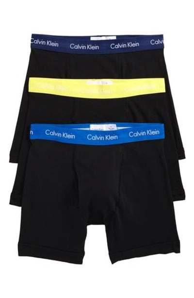 Shop Calvin Klein 3-pack Boxer Briefs In Black W/ Sunbeam/ Blue Multi