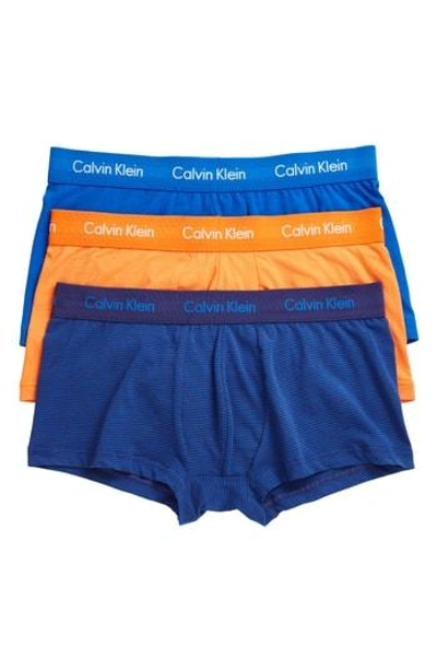 Shop Calvin Klein 3-pack Stretch Cotton Low Rise Trunks In Blue/ Muscari/ Stripe Sunset