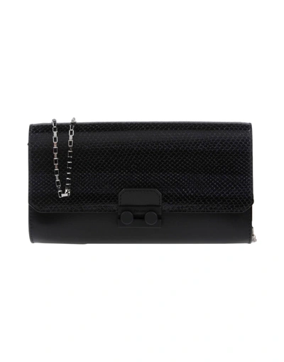 Shop Pollini Handbag In Black