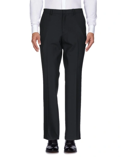 Shop Versace Casual Pants In Black