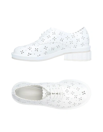 Shop Simone Rocha Laced Shoes In White