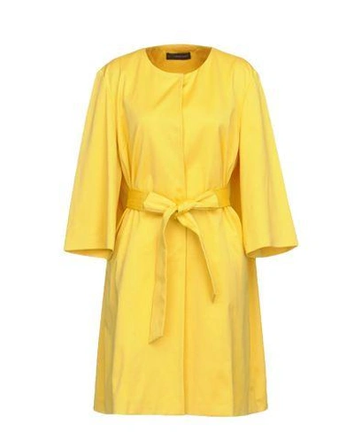 Shop Alessandro Dell'acqua Overcoats In Yellow