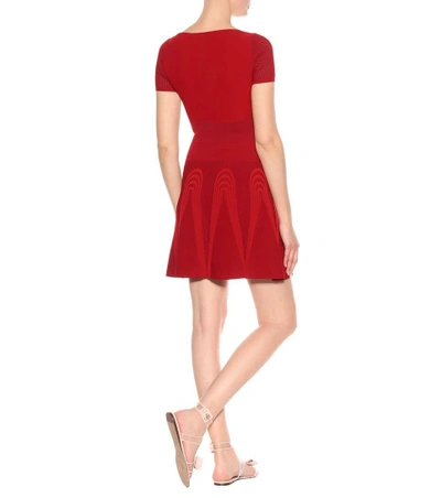 Shop Valentino Ribbed Stretch-knit Minidress In Red