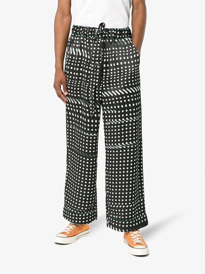 Shop Facetasm Dotted Trousers In Black