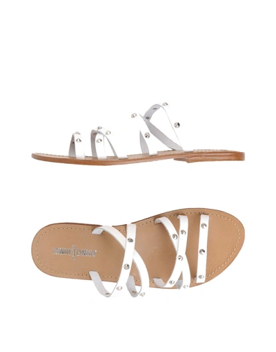 Shop Minnetonka Sandals In White