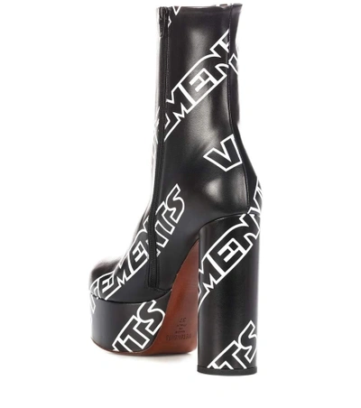 Shop Vetements Printed Ankle Boots In Black