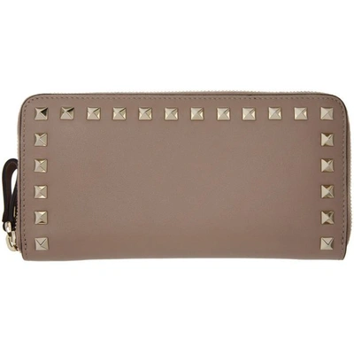 Shop Valentino Pink  Garavani Rockstud Continental Zip Around Wallet In P45 Poudre