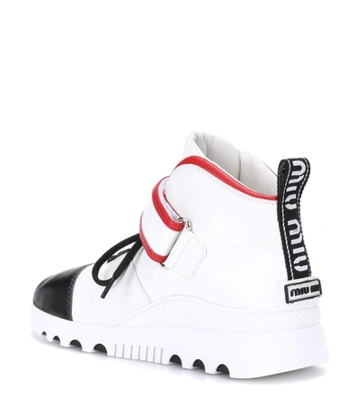 Shop Miu Miu Leather High-top Sneakers In White