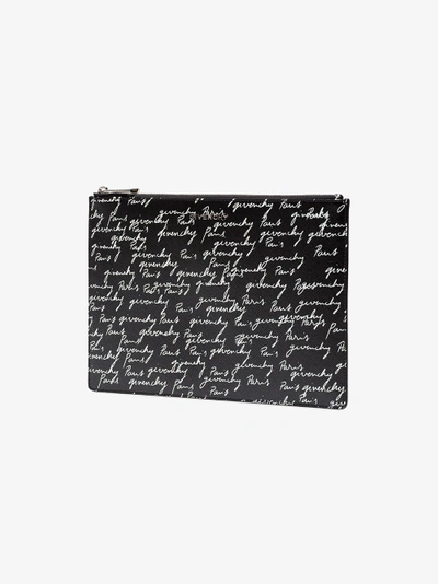 Shop Givenchy Signature Print Clutch In Black