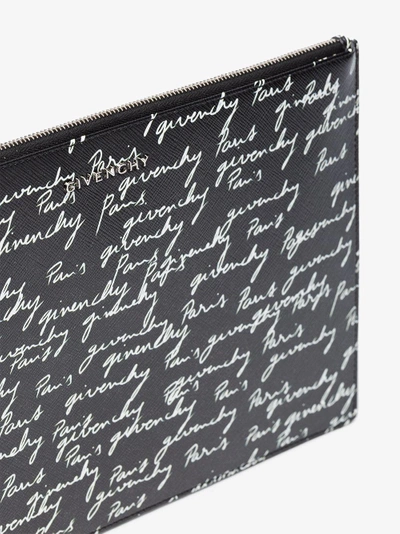 Shop Givenchy Signature Print Clutch In Black