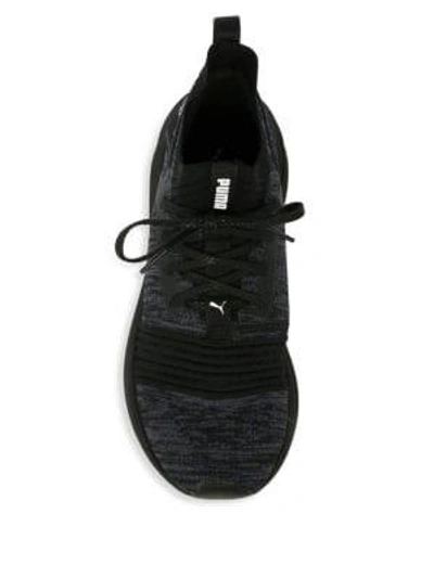 Shop Puma Ignite Limitless Evoknit Sneakers In Black